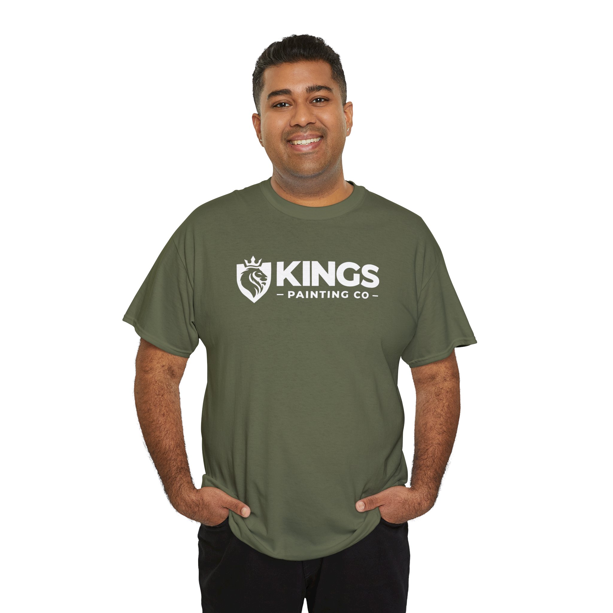 A smiling man in an olive green Kings Painting Co. Logo T‑Shirt (Classic) | Gildan Ultra Cotton (G5000) stands with his hands in his pockets against a white background.
